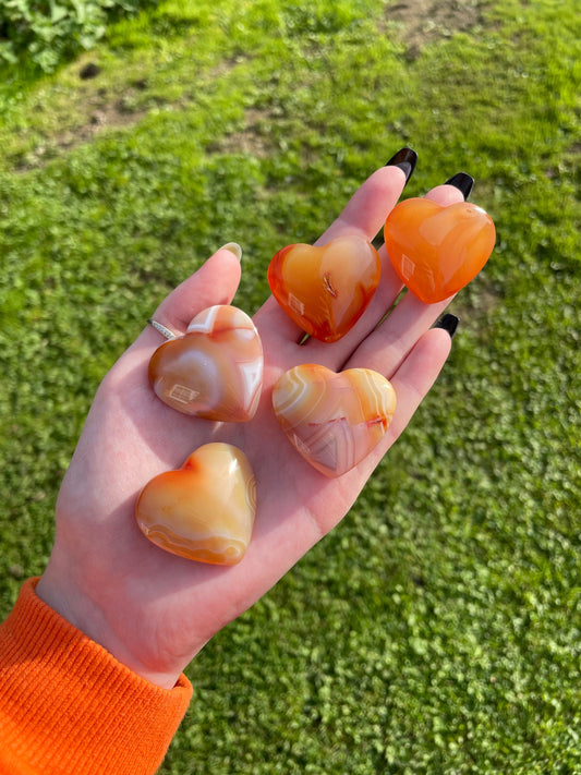 Carnelian palm heart crystal carving