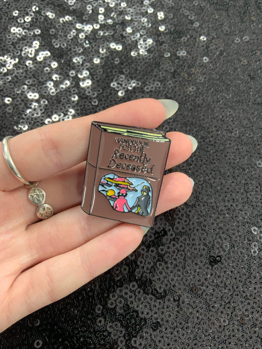 Book for the recently deceased enamel pin