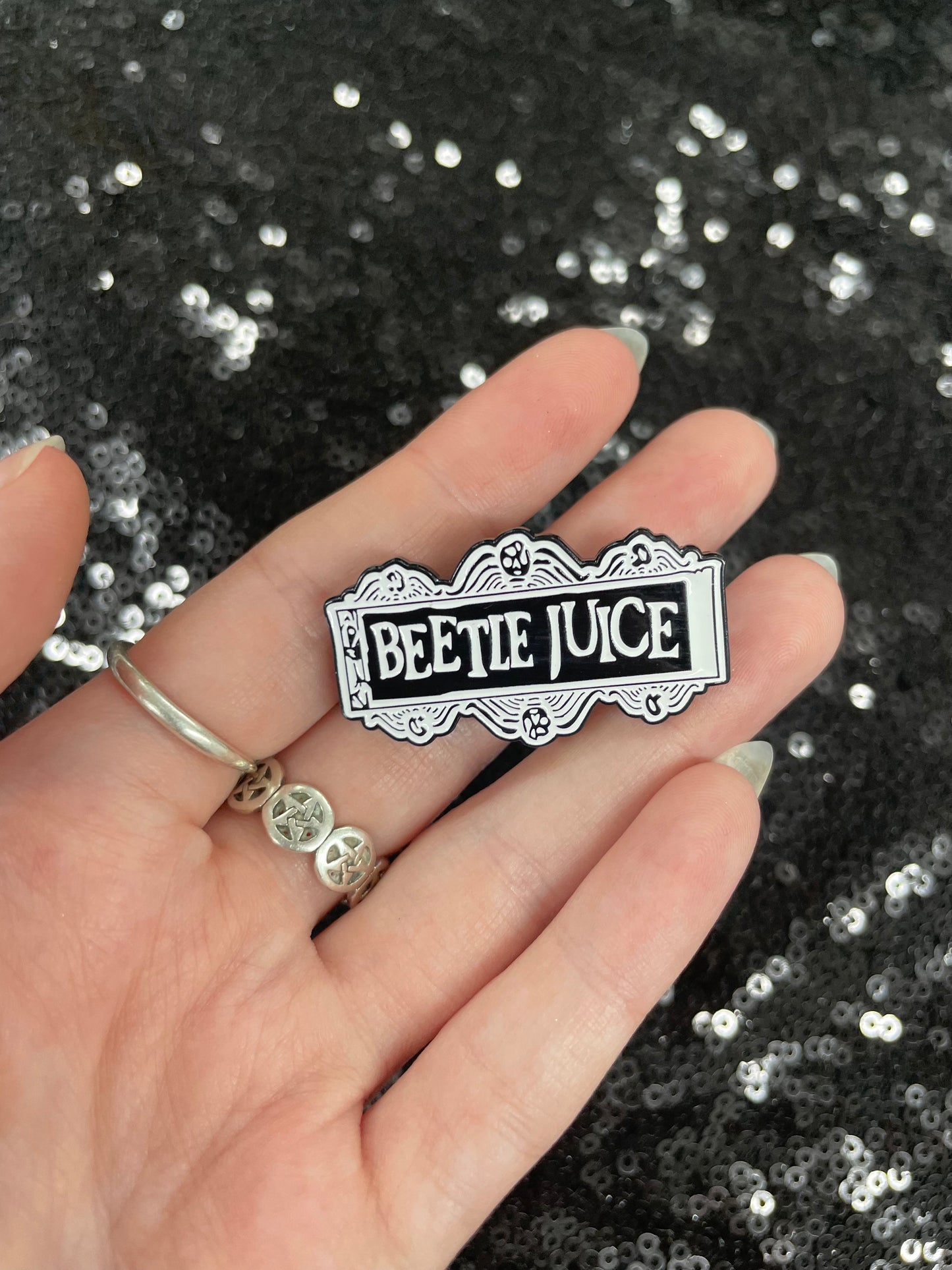 Beetlejuice logo enamel pin